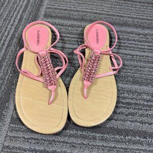 Classified pink flat rhinestone embellished thong ankle strap sandals.